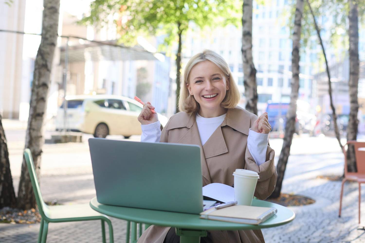 Young girl with headphones smiling during online elementary school class